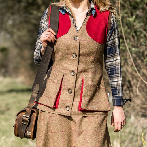 Bridie pictured in our Josie gilet - brown/red colour option